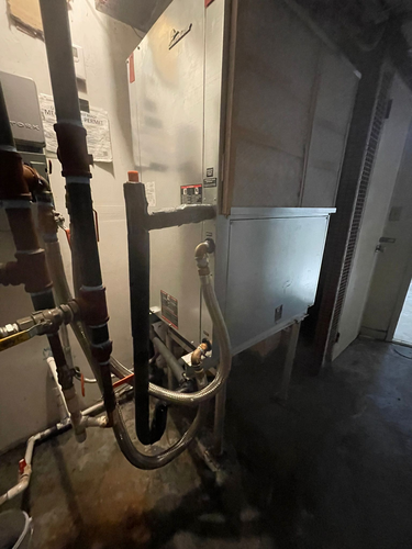 Basement furnace installation completed with professional piping