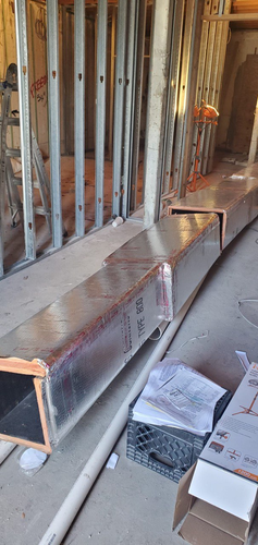 Crane-assisted HVAC unit positioning for commercial installation