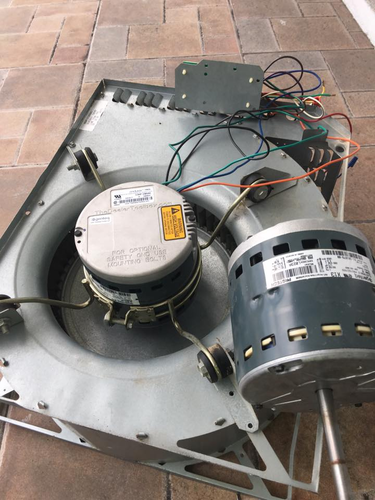 HVAC blower motor component repair showing internal system maintenance