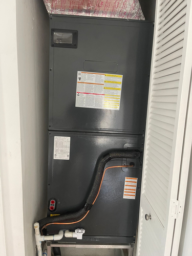 Residential AC unit installation with proper placement