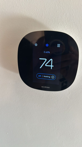 Smart Ecobee thermostat installation showing modern climate control technology